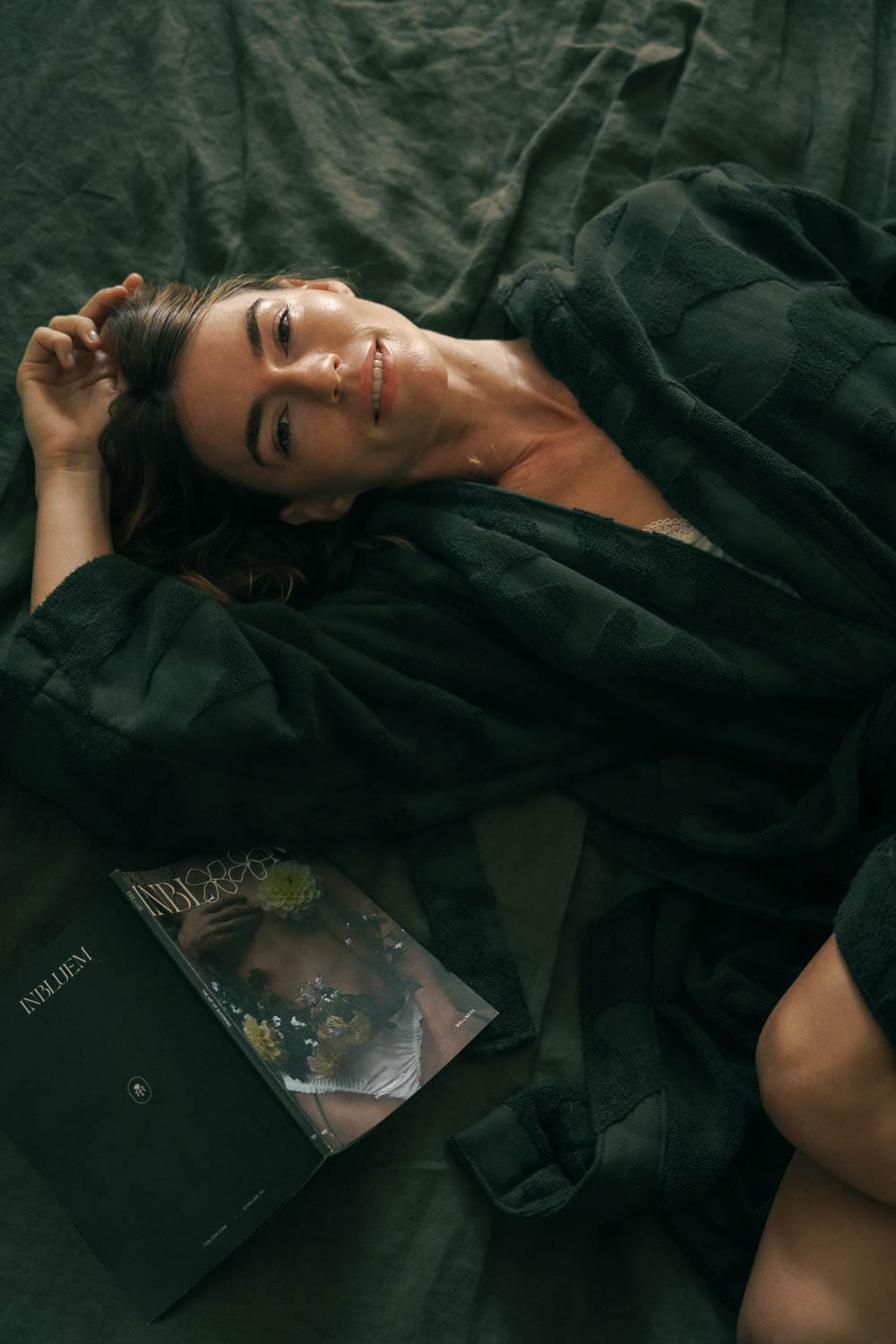 A guest resting in a green robe